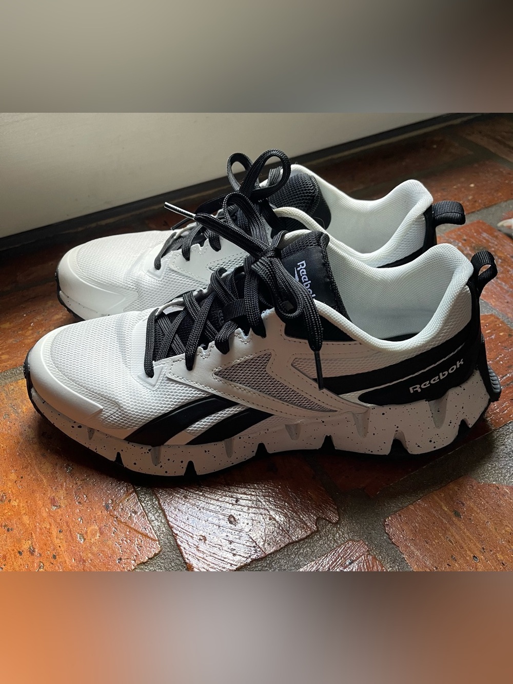 Reebok Men’s White and Black Athletic Sneakers